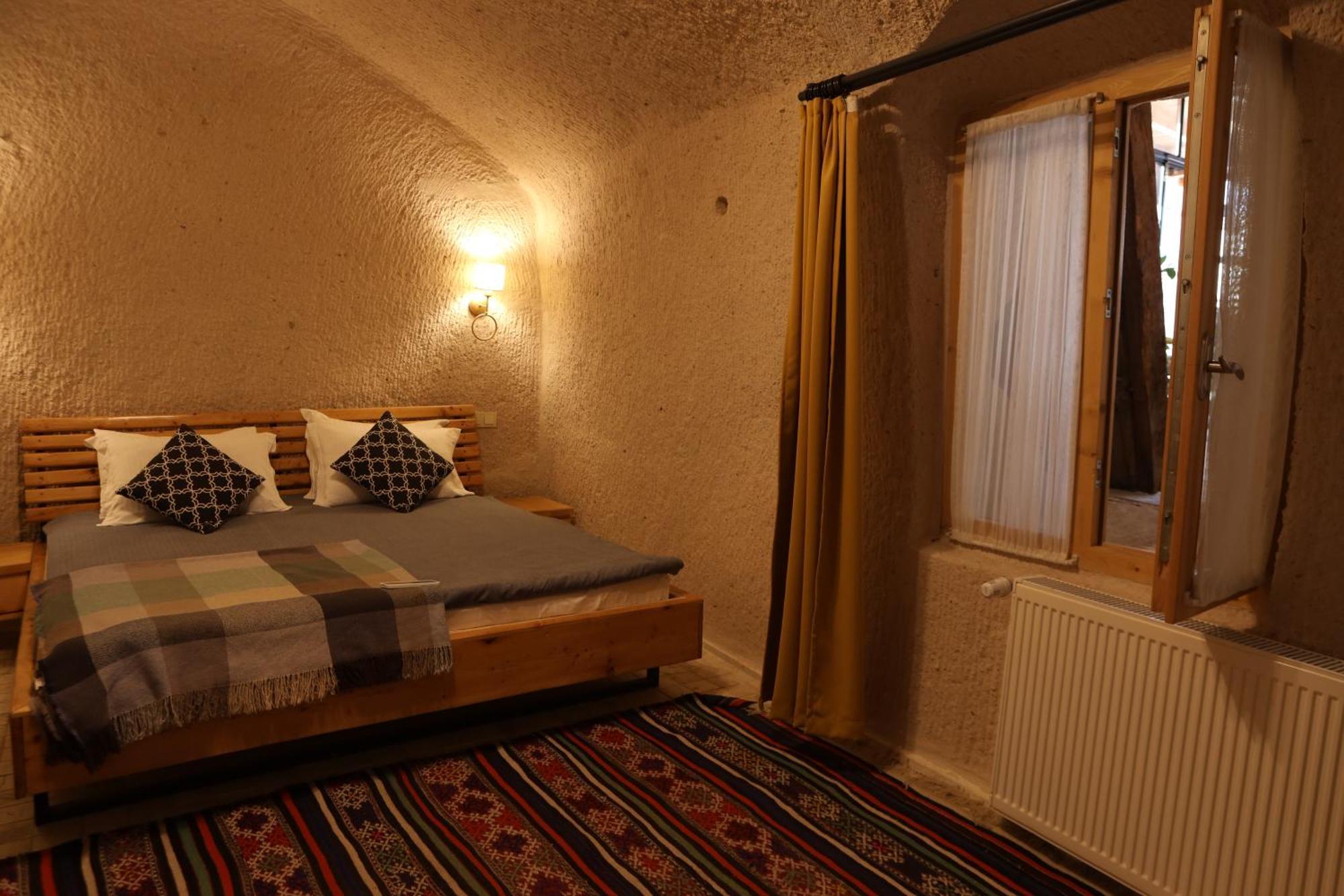 Pinhan Cave Suites Учисар Экстерьер фото